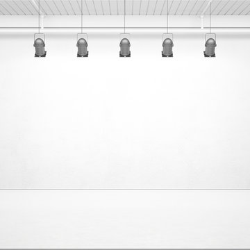 White room with lamps on the wall