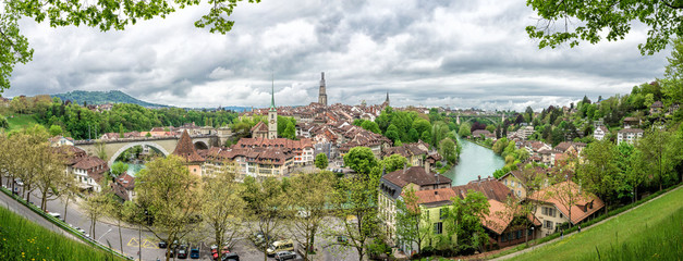 Church, bridge and houses with tiled rooftops, Bern - 53928125