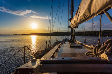 Obraz na płótnie Canvas sunset at sea on aboard Yacht Sailing