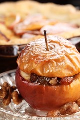 Baked stuffed apple on plate