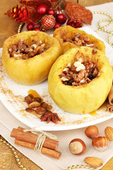 Baked apples on plate close up