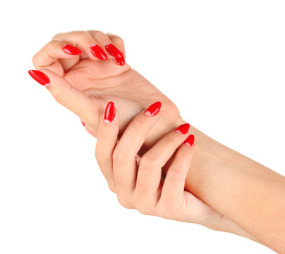 Beautiful female hands with red nails isolated on white