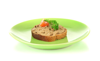 Toasted bread with pate on color plate, isolated on white