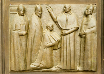 Bas-relief on the church Saints Gervasio and Protasio Protasio