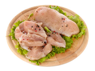 Chicken meat on board isolated on white