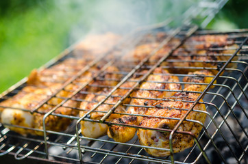 Chicken legs on the grill