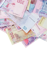 Pile of Ukrainian money, isolated on white