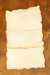 Old papers on wooden background