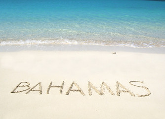 BAHAMAS writing on a desrt beach
