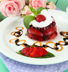 Tasty jelly dessert with fresh berries,