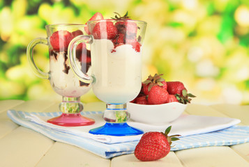 Delicious strawberry desserts in glass vase