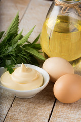 Mayonnaise in bowl on table
