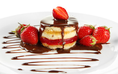 Tasty biscuit cake with chocolate and berries
