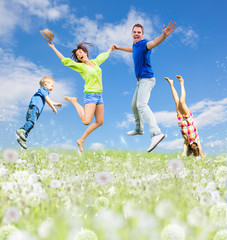 family jump in the summer