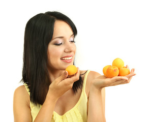Girl with fresh apricots isolated on white