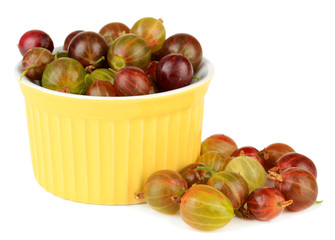 Fresh gooseberries in bowl isolated on white
