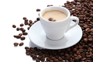 Cup of coffee with coffee beans, isolated on white