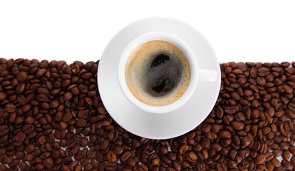 Cup of coffee with coffee beans, isolated on white