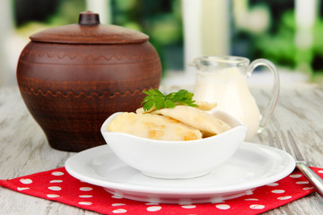 Tasty dumplings with fried onion