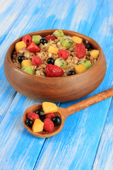 Oatmeal with fruits on table close-up