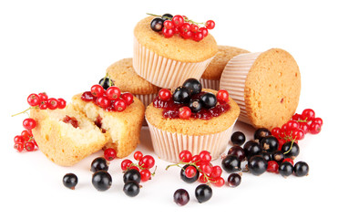 Tasty muffins with berries isolated on white