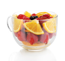 Useful fruit salad in glass cup isolated on white