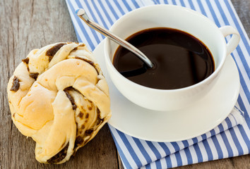 A Cup of coffee with bakery.