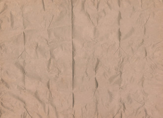Delicate folded pink wax paper background texture