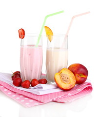 Delicious milk shakes with strawberries and peach isolated