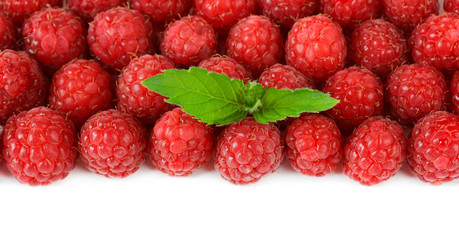 Ripe sweet raspberries isolated on white