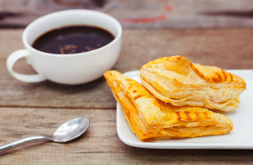 A Cup of coffee with bakery.