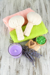 Still life with lavender candle, soap, massage balls, soap and