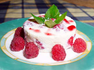 Panna cotta Italian dessert with raspberry