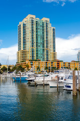 View of luxurious boats and yacht docked in a Miami Beach Marina