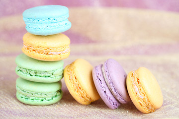 Macaroons on fabric background