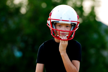 Youth football player © tammykayphoto