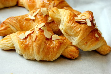 Almond croissants on a white background