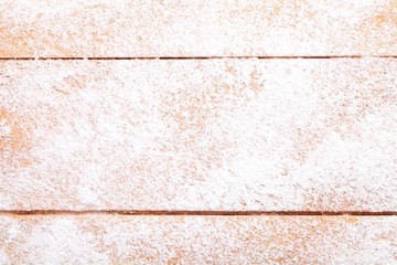 Wooden board with powdered sugar
