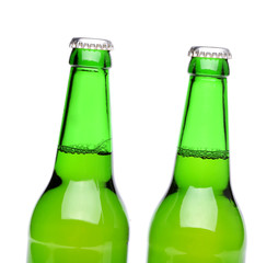 Two bottles of light ale on white background.