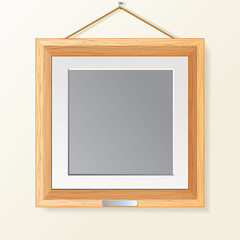 Blank Wooden Photo Frame on the Wall