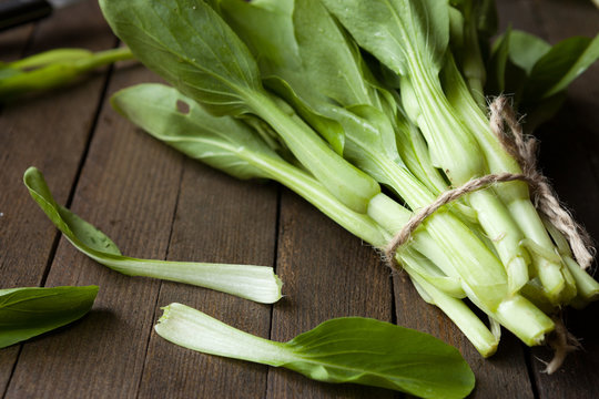 armful of fresh greens for salad