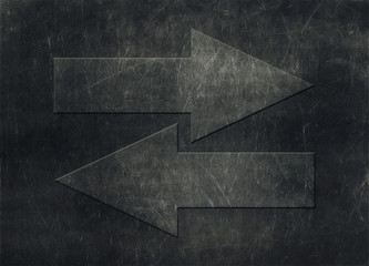 Two arrows pointing in opposite directions, grunge background