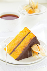 Pumpkin cake with chocolate cream.