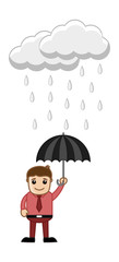 Man Holding an Umbrella in Rain