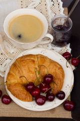 breakfast with fresh croissants and coffee