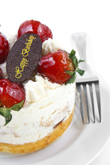 strawberry butter cream cake with birthday chocolate plate & for