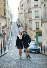 Dating couple walking in Paris