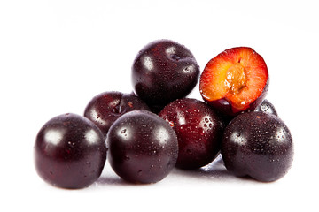 plums isolated on white background