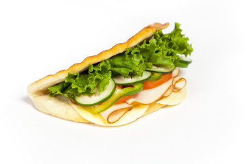 Sandwich with turkey, tomato, cucumber