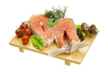 Raw fresh bright salmon with vegetables